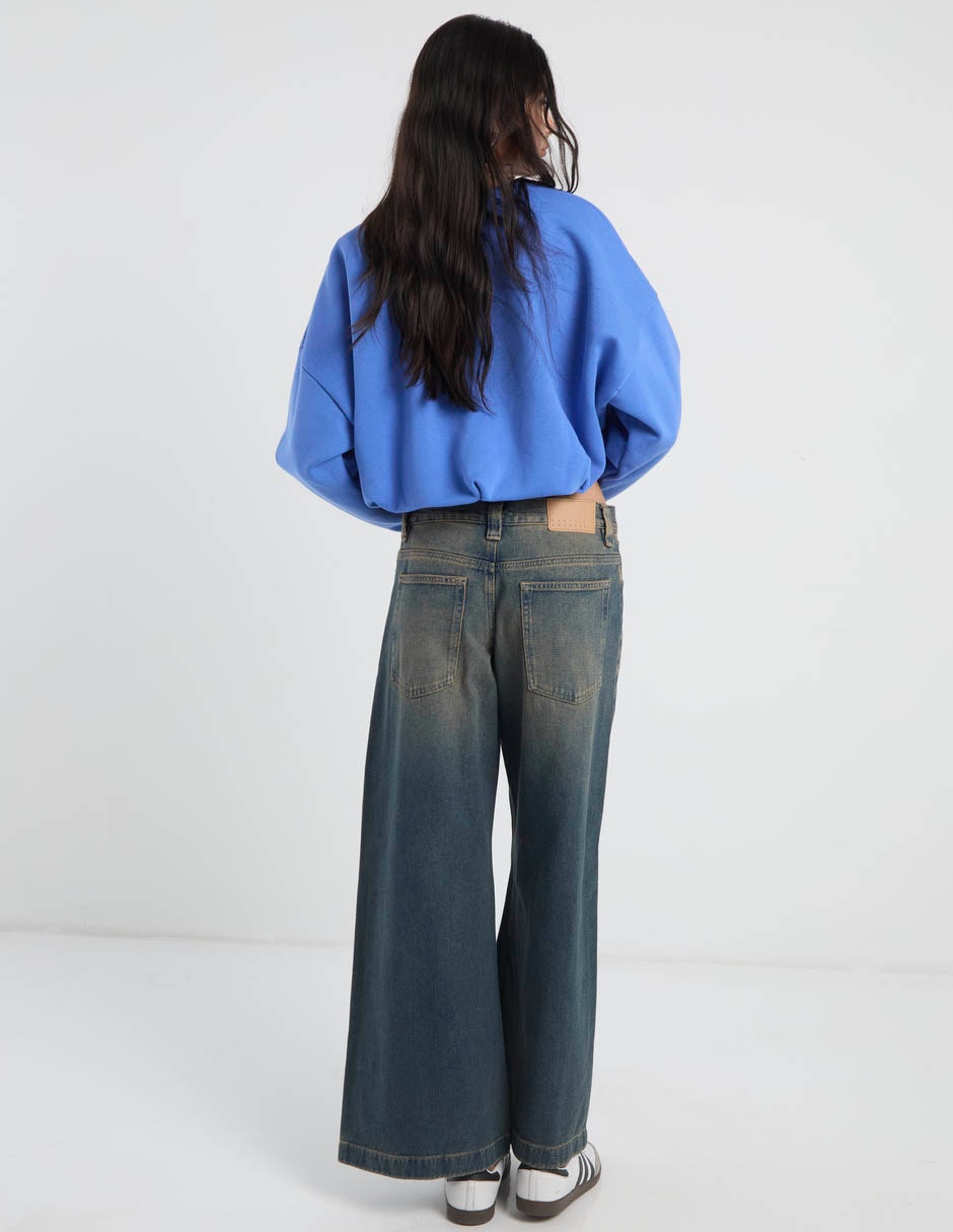 Jeans acampanado corte cintura para mujer 6