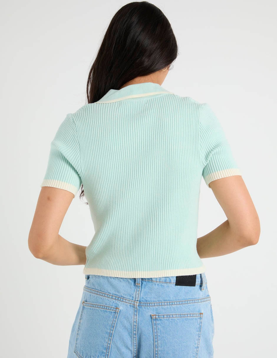 Playera manga corta cuello polo para mujer 6